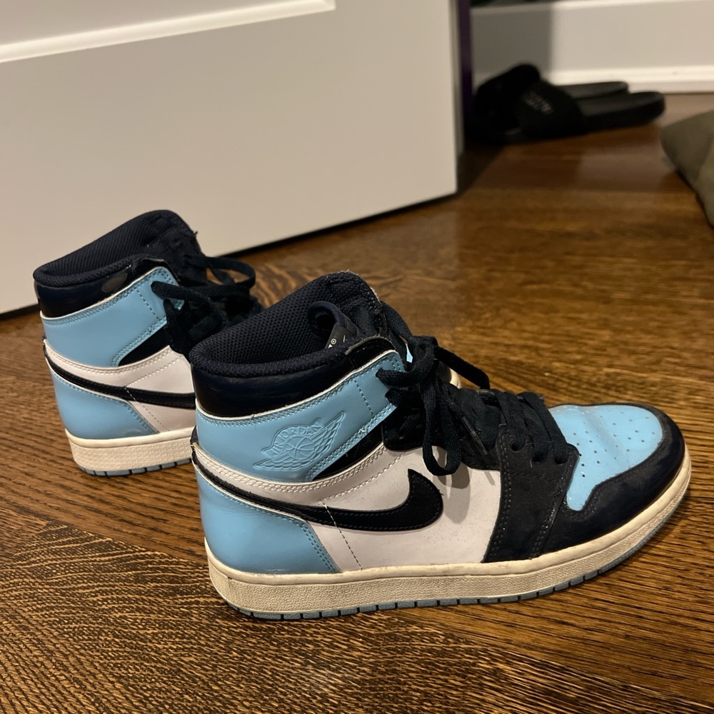 Nike Blue and Black Sneakers with Classic High-Top Design